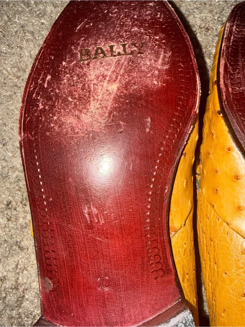 Bally of Switzerland genuine ostrich leather dress loafers.